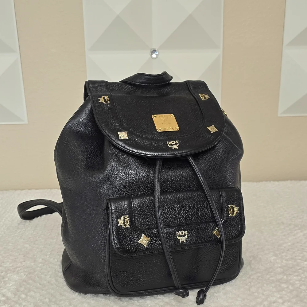 MCM Black Leather Studded Backpack Gold Hardware Drawstring Side Zip